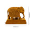 Decorative elephant figurine with intricate carvings on a white background